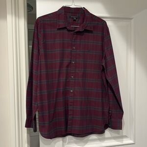 John Varvatos Button Down Peace logo